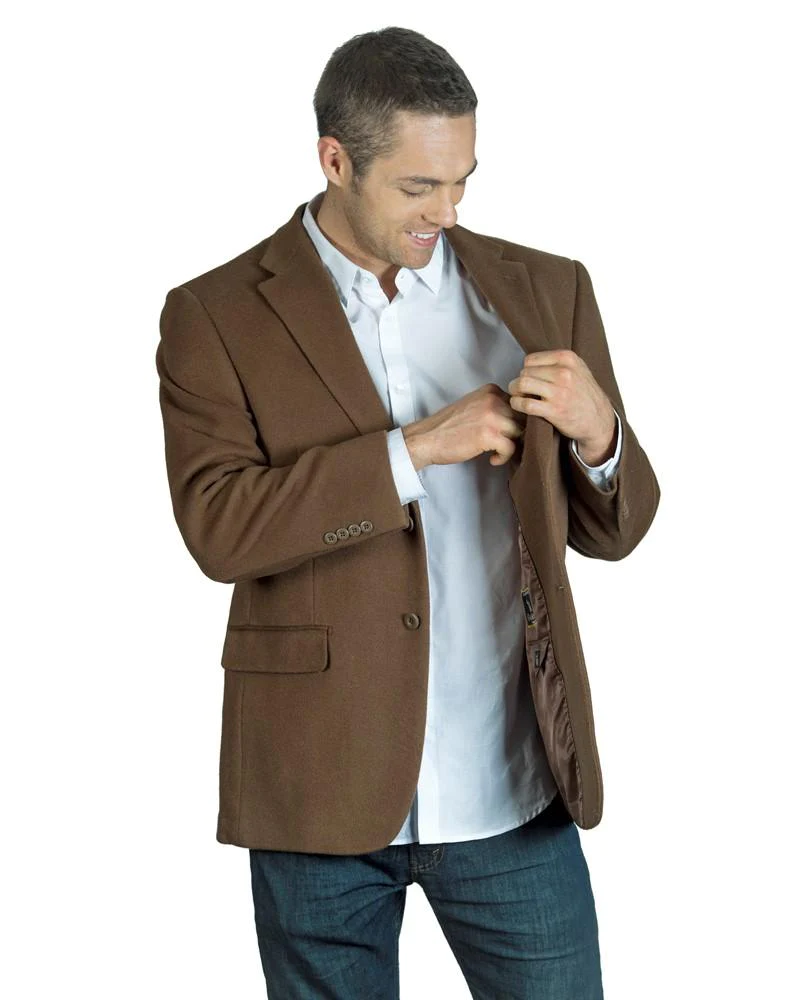 smiling man wearing brown bulletproof sportscoat