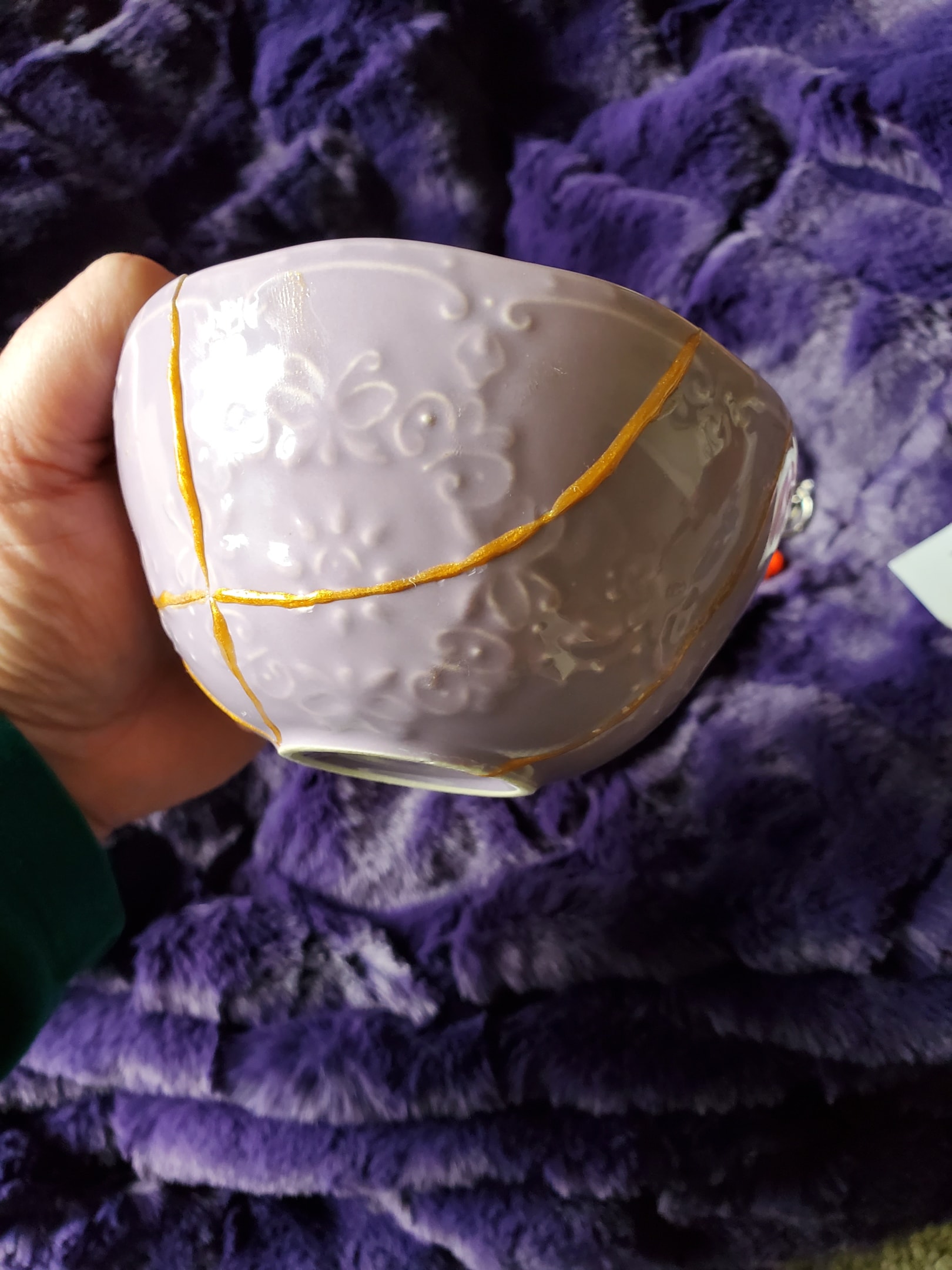 A photo from the author of her piece of pottery from her first Kintsugi workshop.