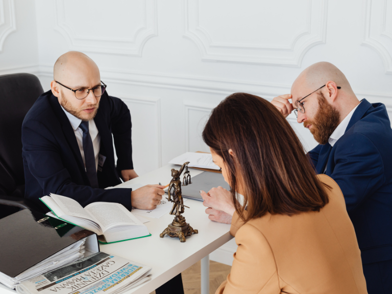 Image of a personal injury attorneys discussing a car accident trial in Lawrenceville.