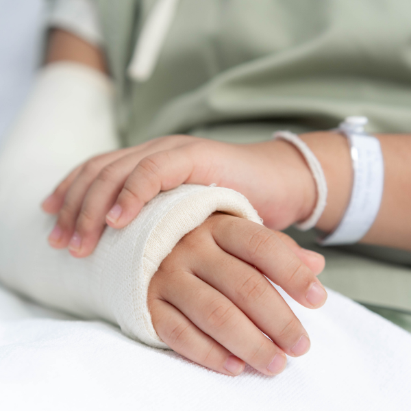 Image of a person injured after a truck accident on the highway.