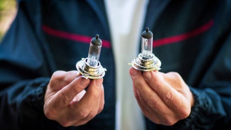 Replacement of burn-out with a new headlight bulb.
