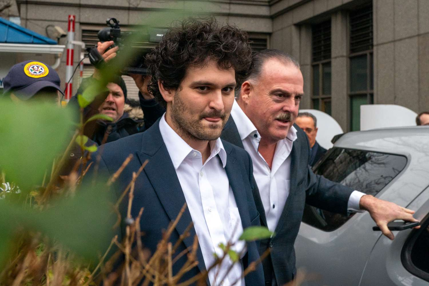 An image of Sam Bankman-Fried arriving for court hearing in the US. 
