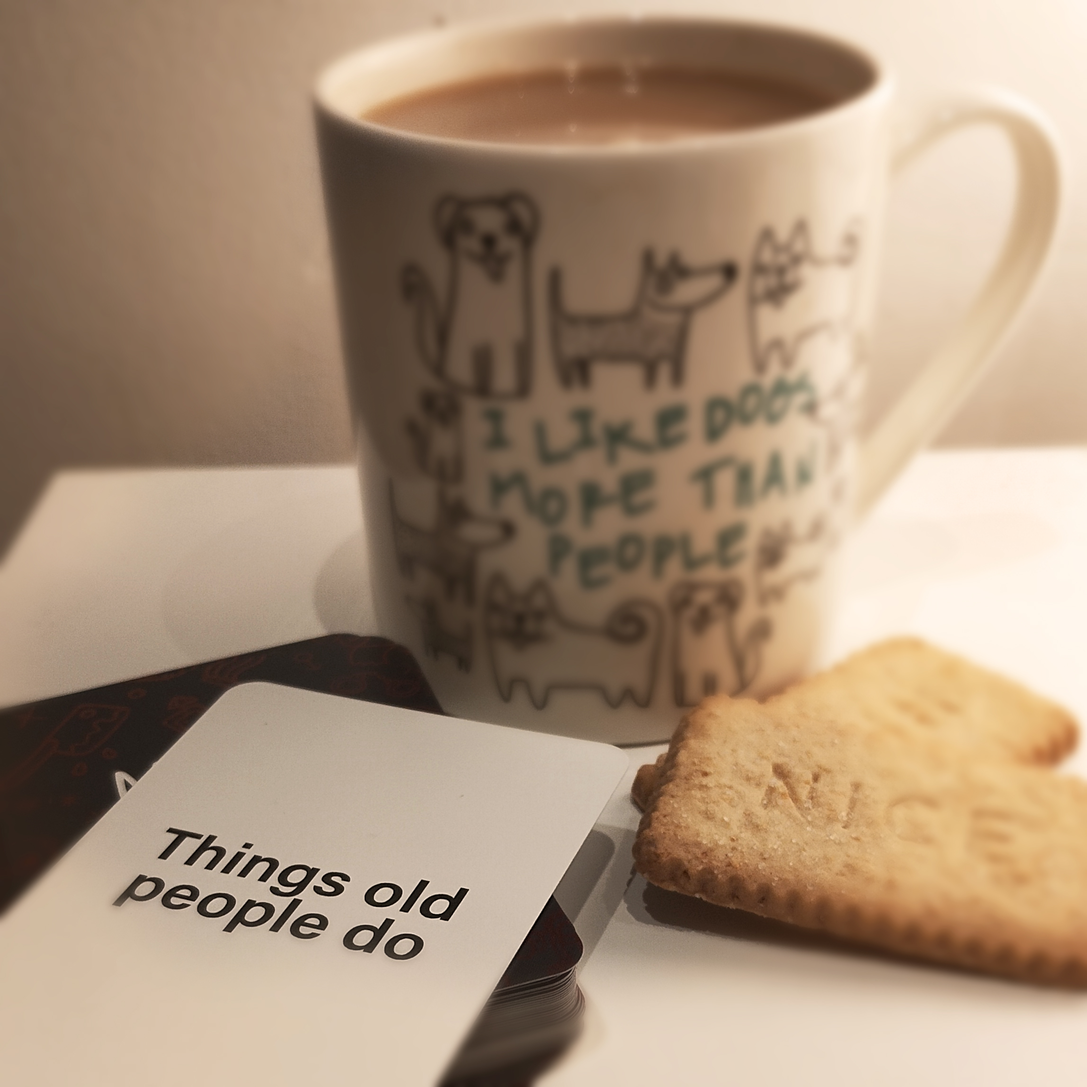 Manic Minute card game, playing with tea and biscuits