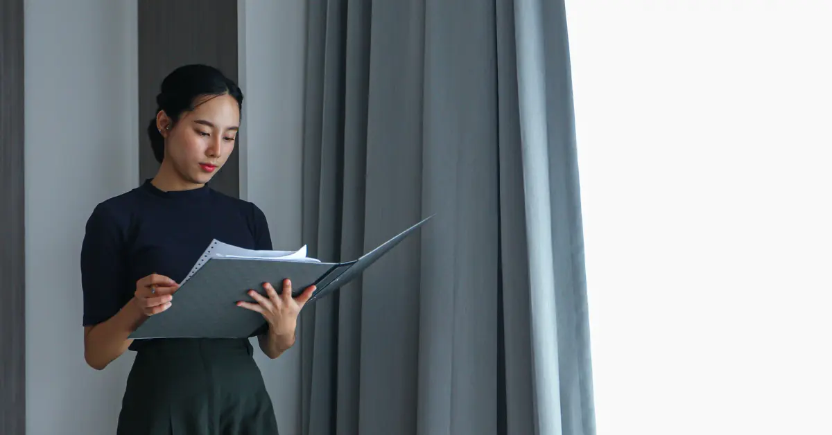 OnlyFans creator reviewing documents ahead of the S Corp tax return due date.