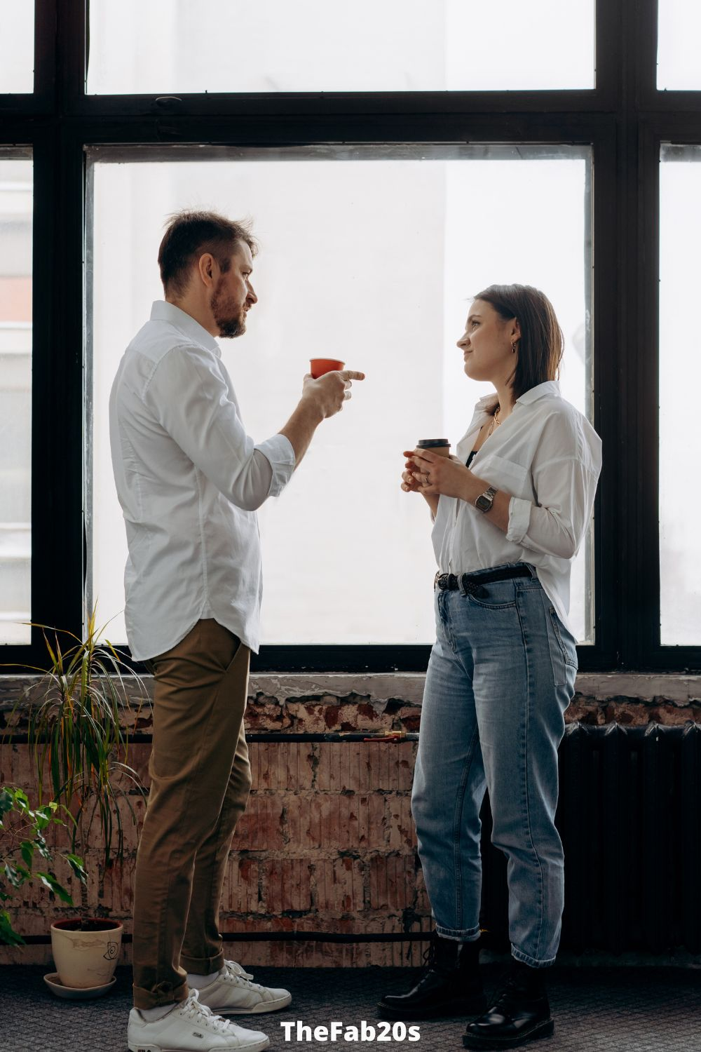 man and woman talking - Featured In Signs a Married Man Is Using You