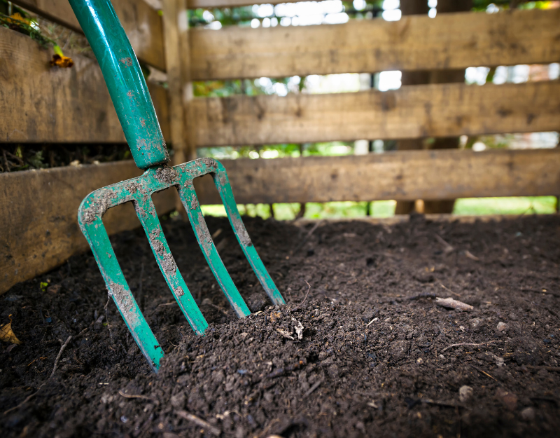 Turning your compost allows it to decompose into garden soil.