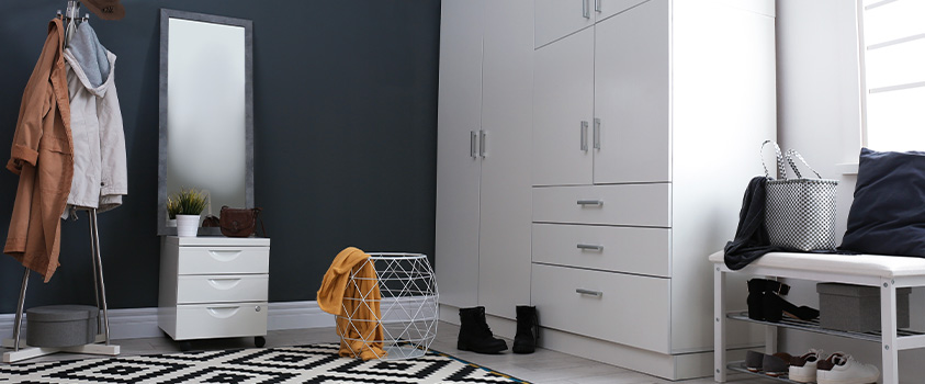 A closed wardrobe is perfect for hiding the clutter and keeping your clothes dust free.