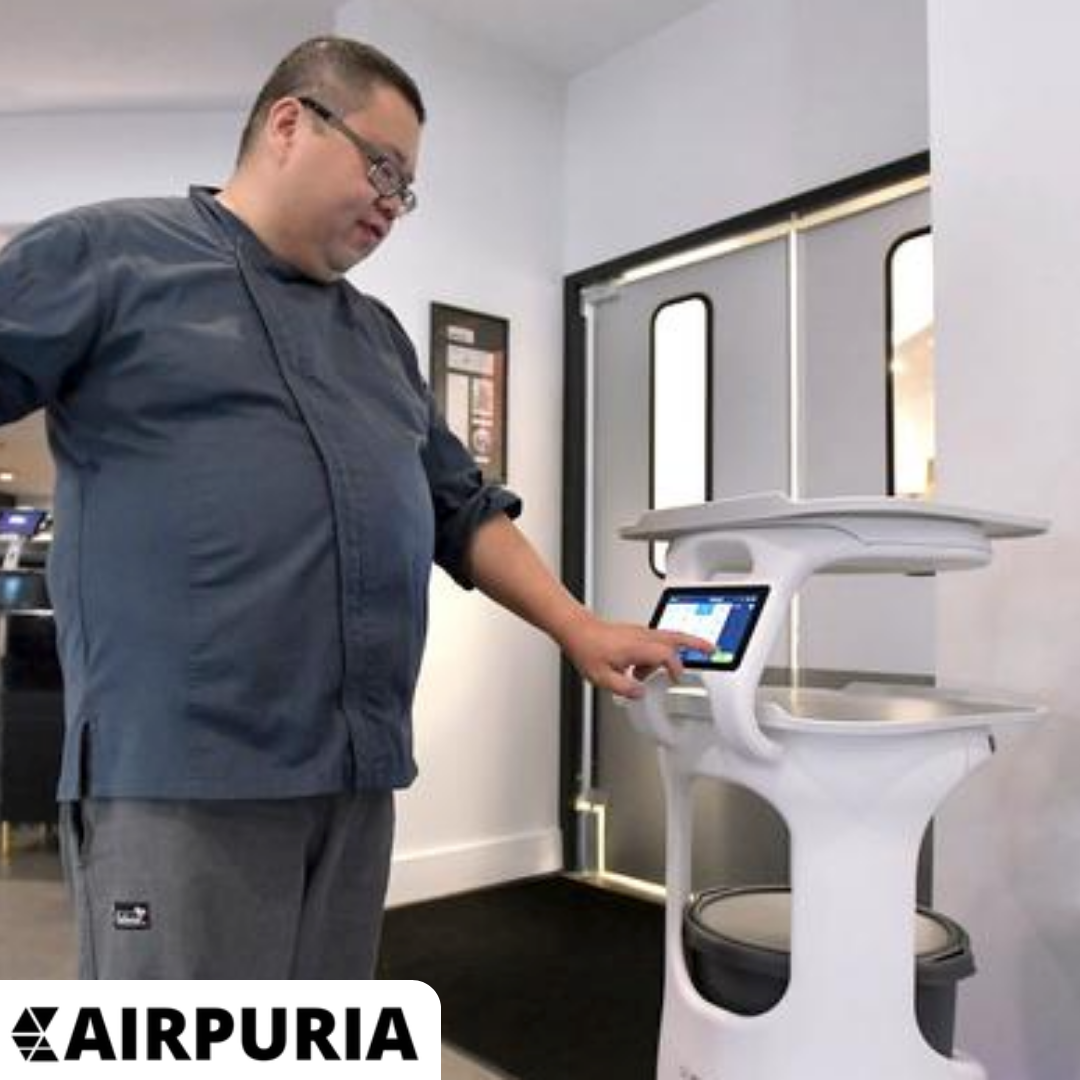 Image illustrating why former Mcdonalds chief executive speaks highly of service robots.
