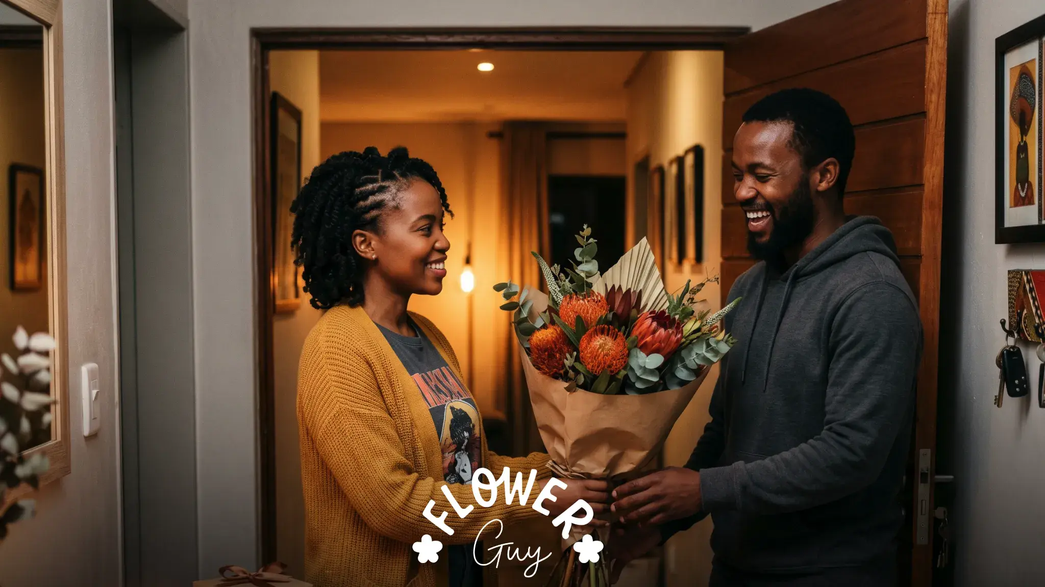Black South African girlfriend handing boyfriend protea bouquet with happy birthday messages for boyfriend