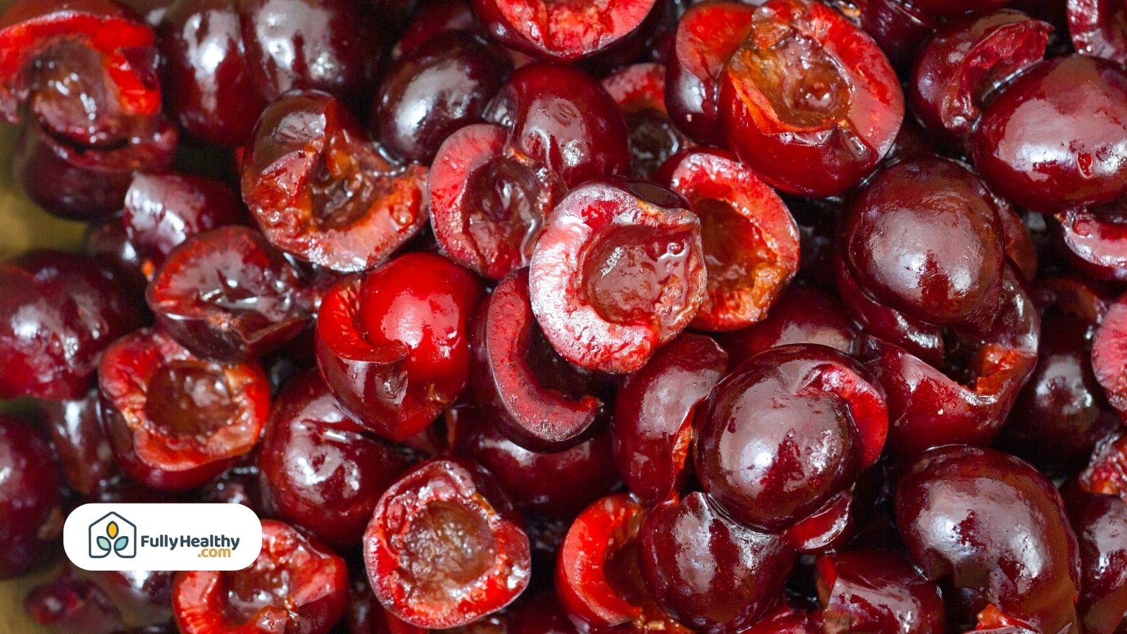 Close-up of pitted cherries with juicy texture, showing dark red flesh and glossy skin