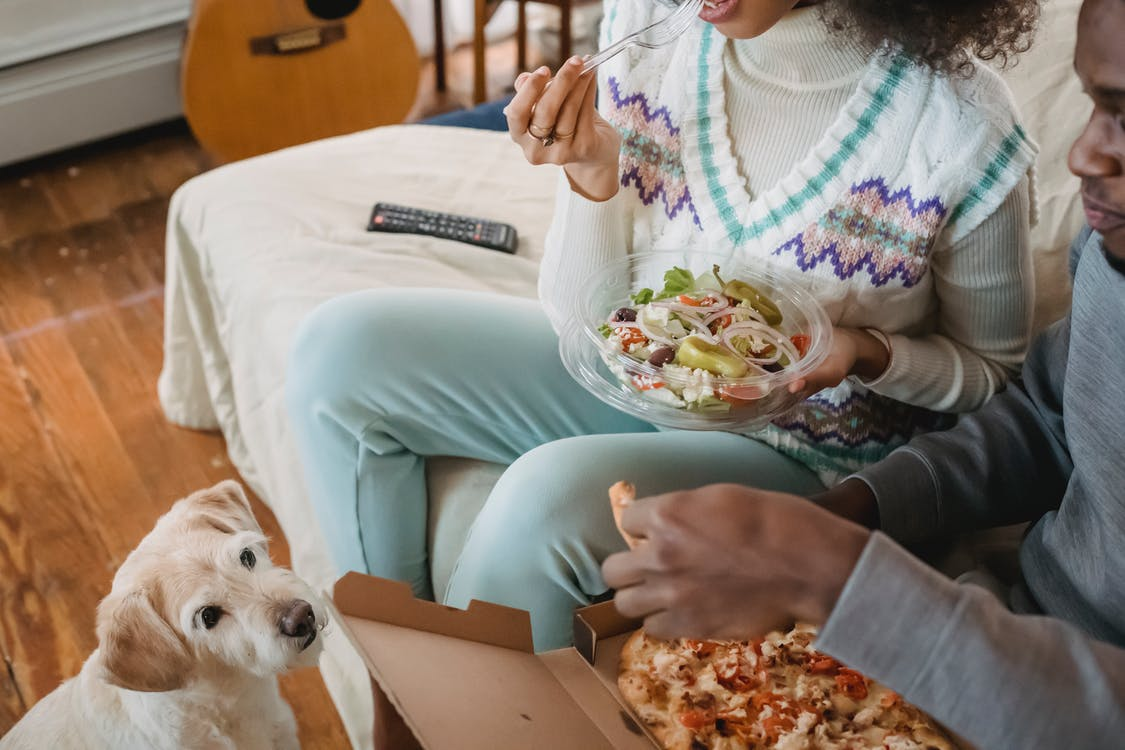 Eating in the living room might sound great but it can lead to unhealthy eating habits | Photo by Andres Ayrton from Pexels