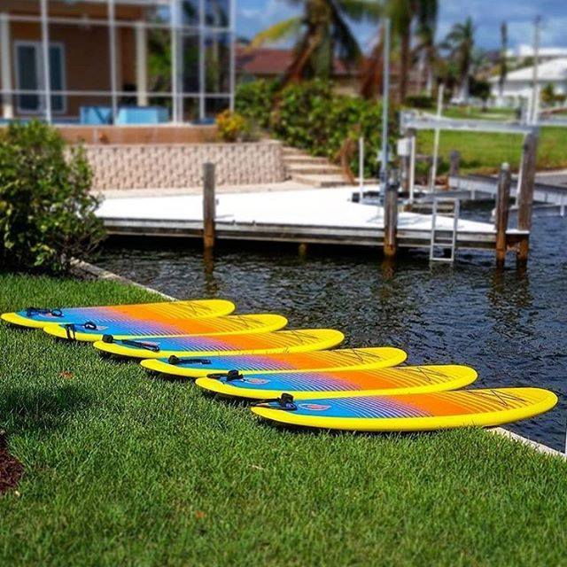 inflatable paddle board rental and beach chairs for water sports 