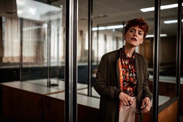 Woman standing in front of conference room