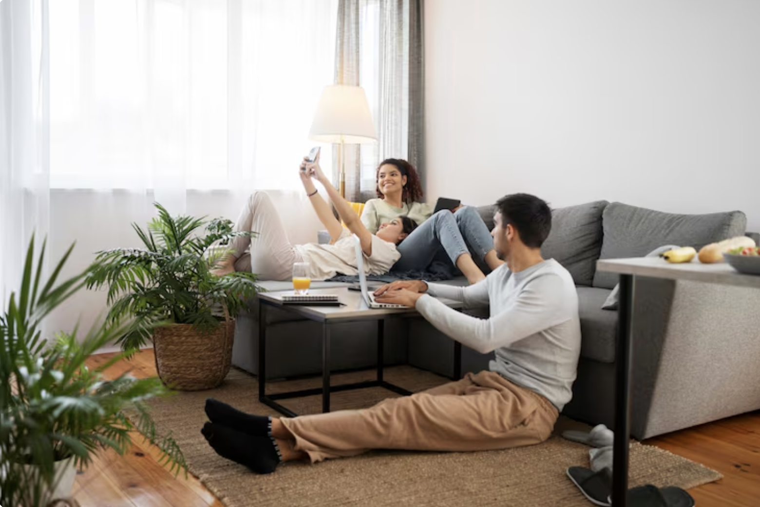 Roommates gathered in the living room