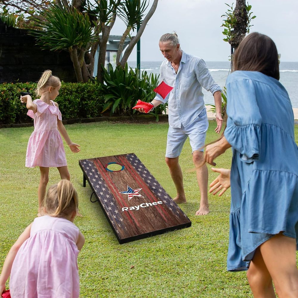 A family playing cornhole with bags and handles included