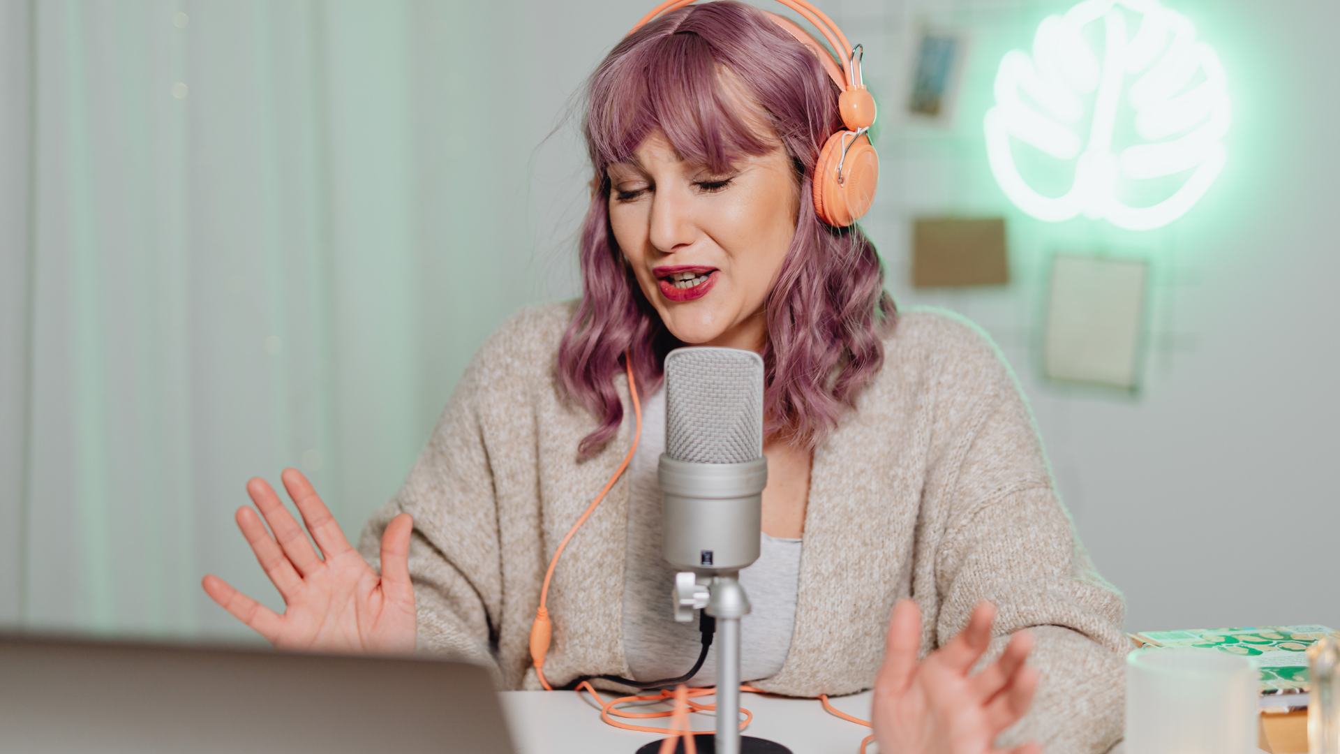 woman talking into a microphone