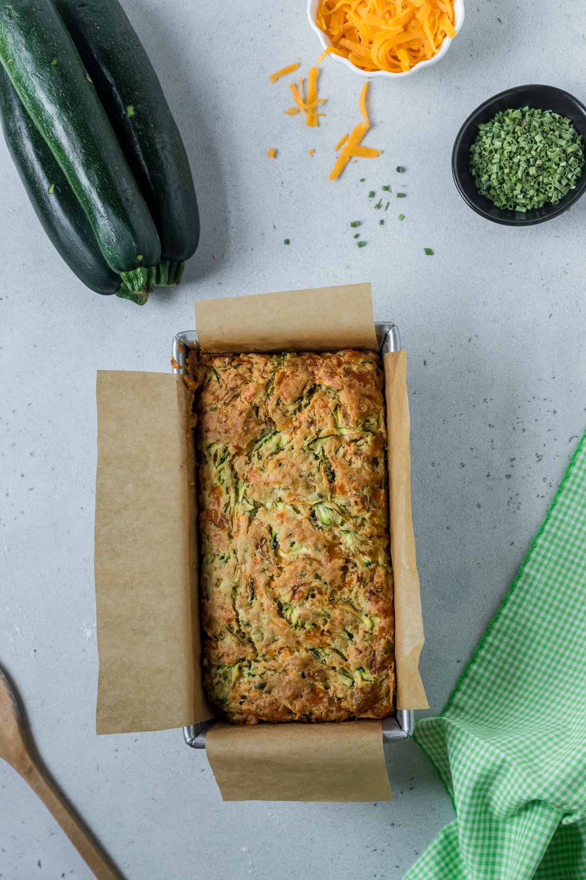 baked zucchini cheddar bread in loaf pan