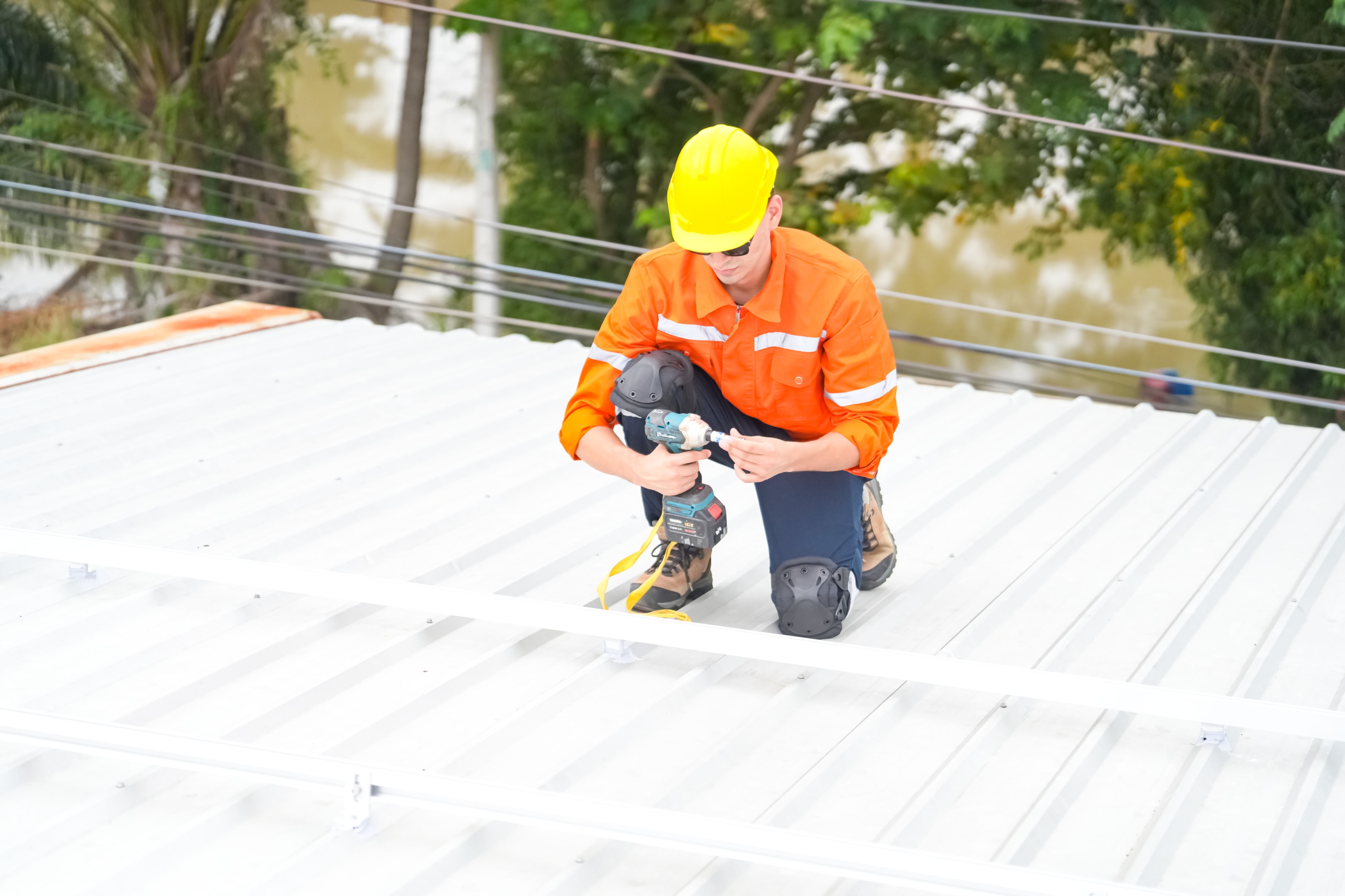 Men technicians mounting photovoltaic solar modules