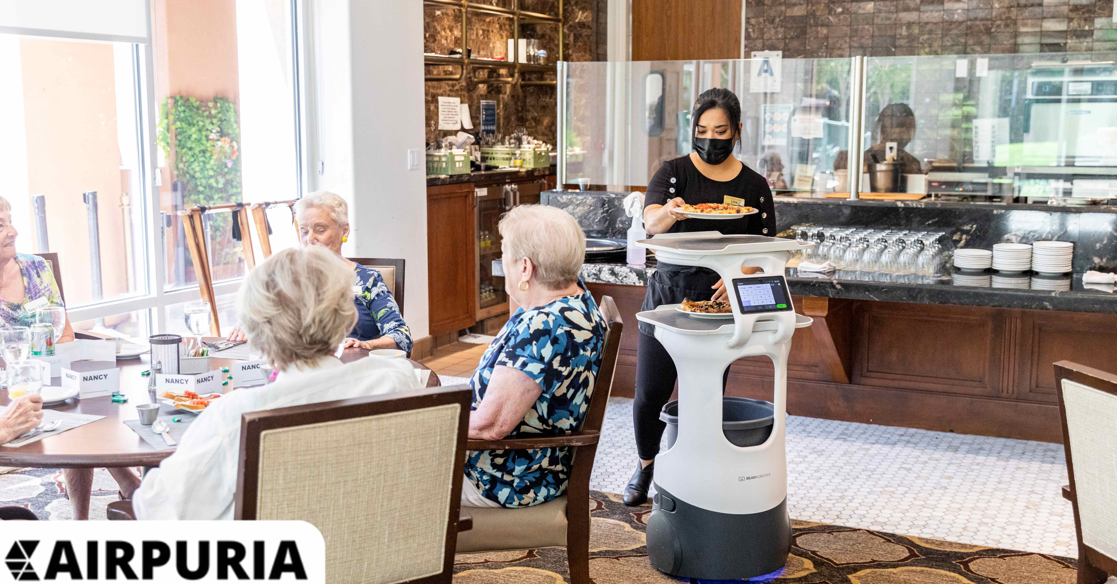 Image showing why human employees are operating robot waiters for drinks.