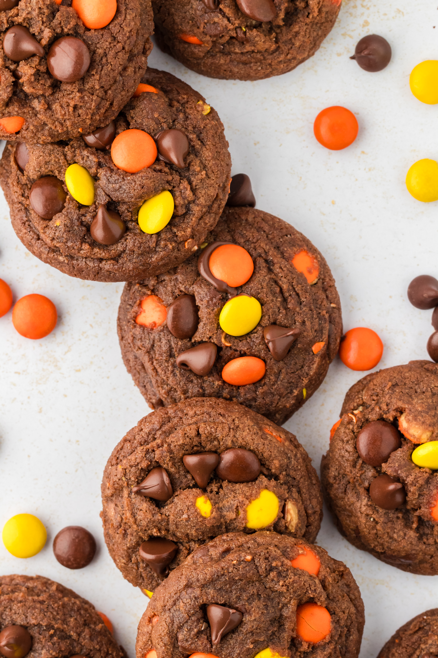reese's pieces chocolate cookies scattered on counter