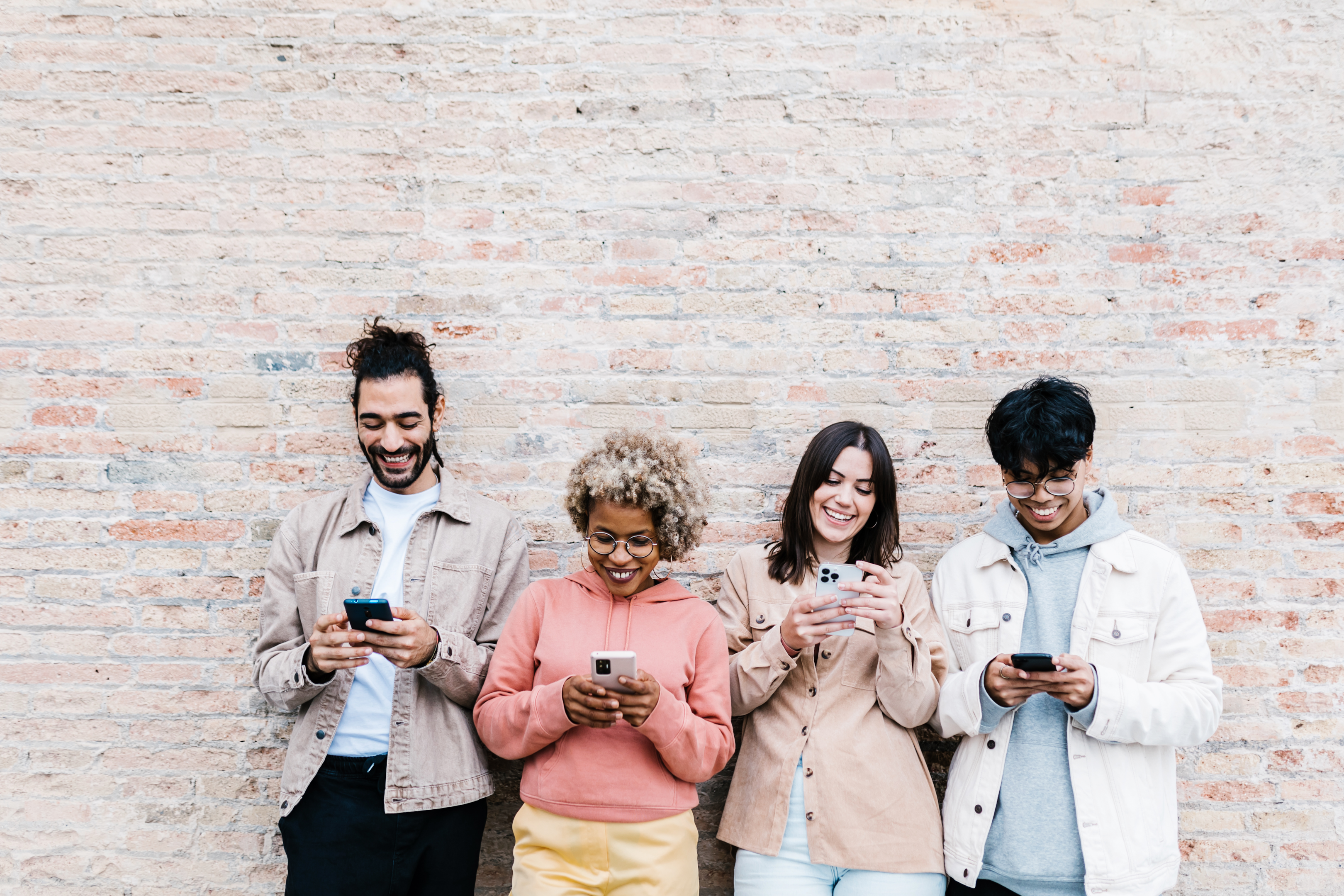 Group of people using mobiles