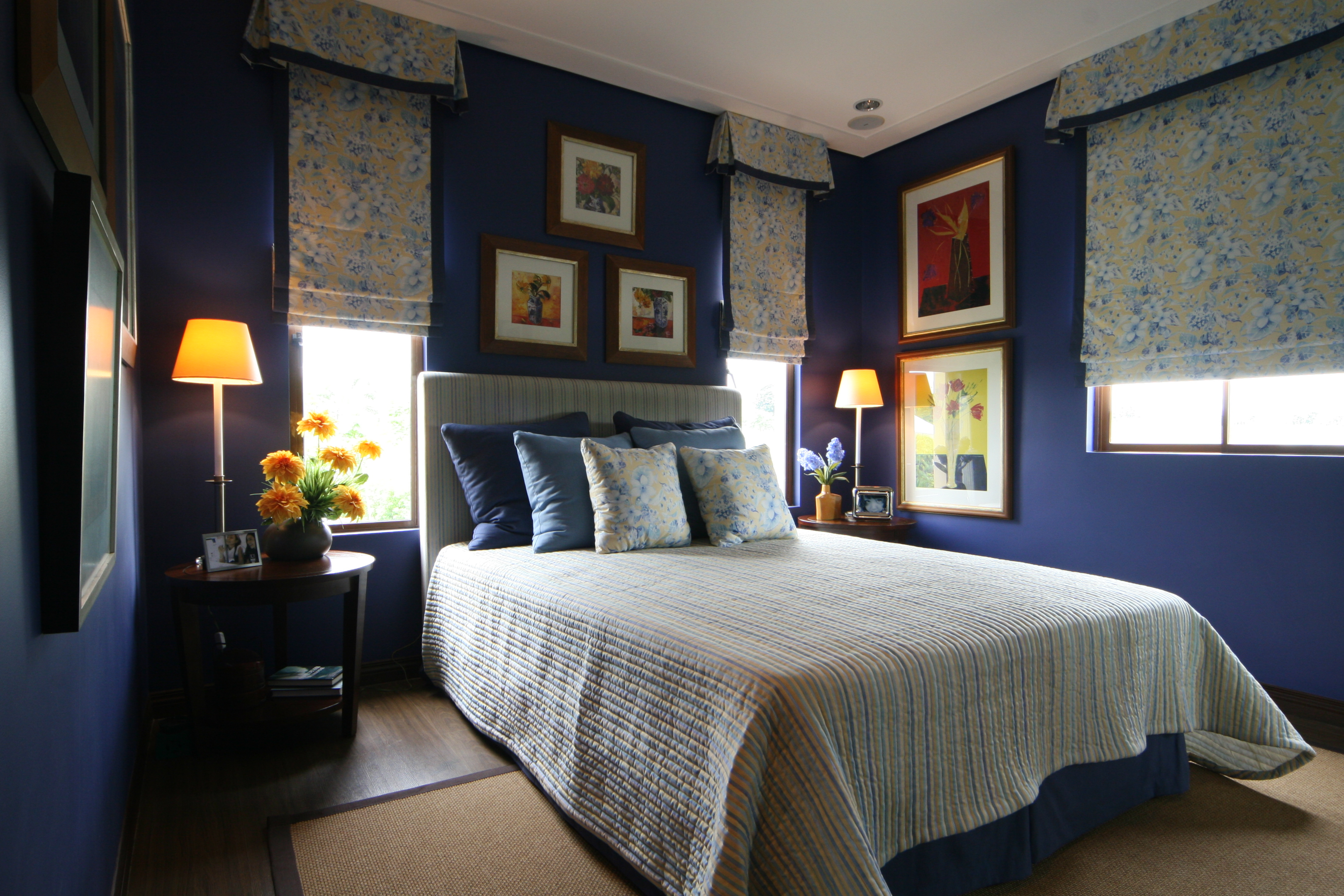 Image of a luxury bedroom with color blue paint