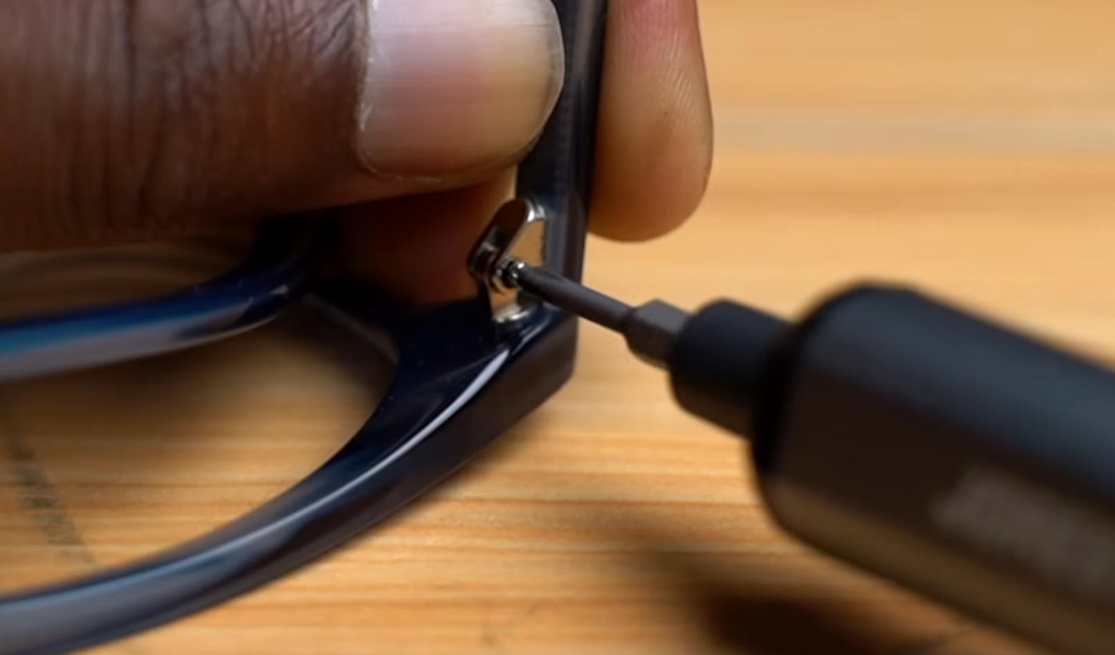 eyeglasses and Jorest screwdriver
