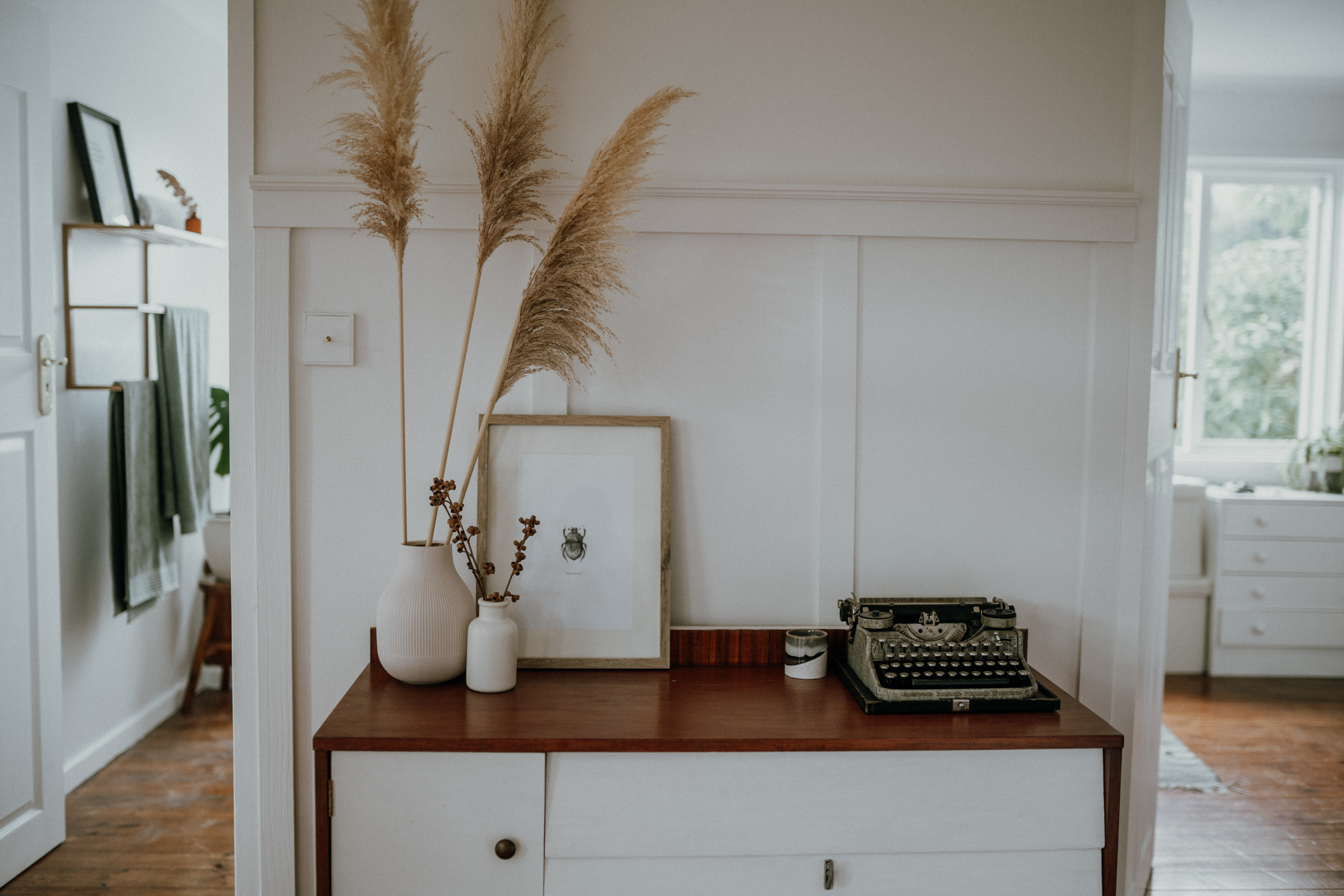 vintage typewriter and decor on console table
