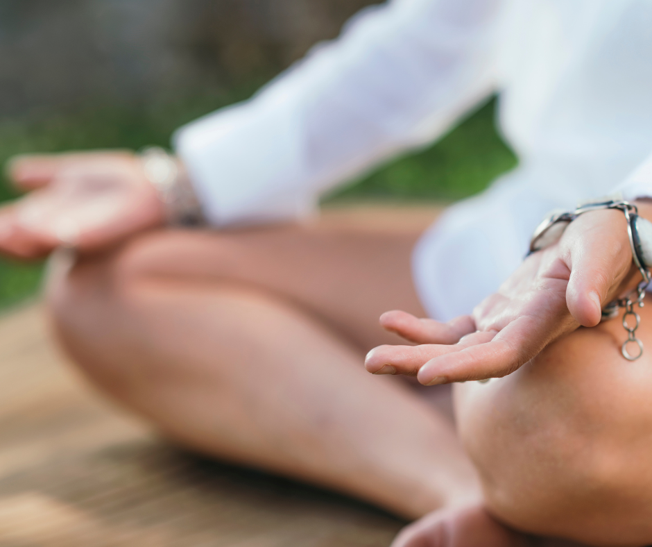  A person meditating, understanding the power of mindfulness and self-awareness in quitting alcohol