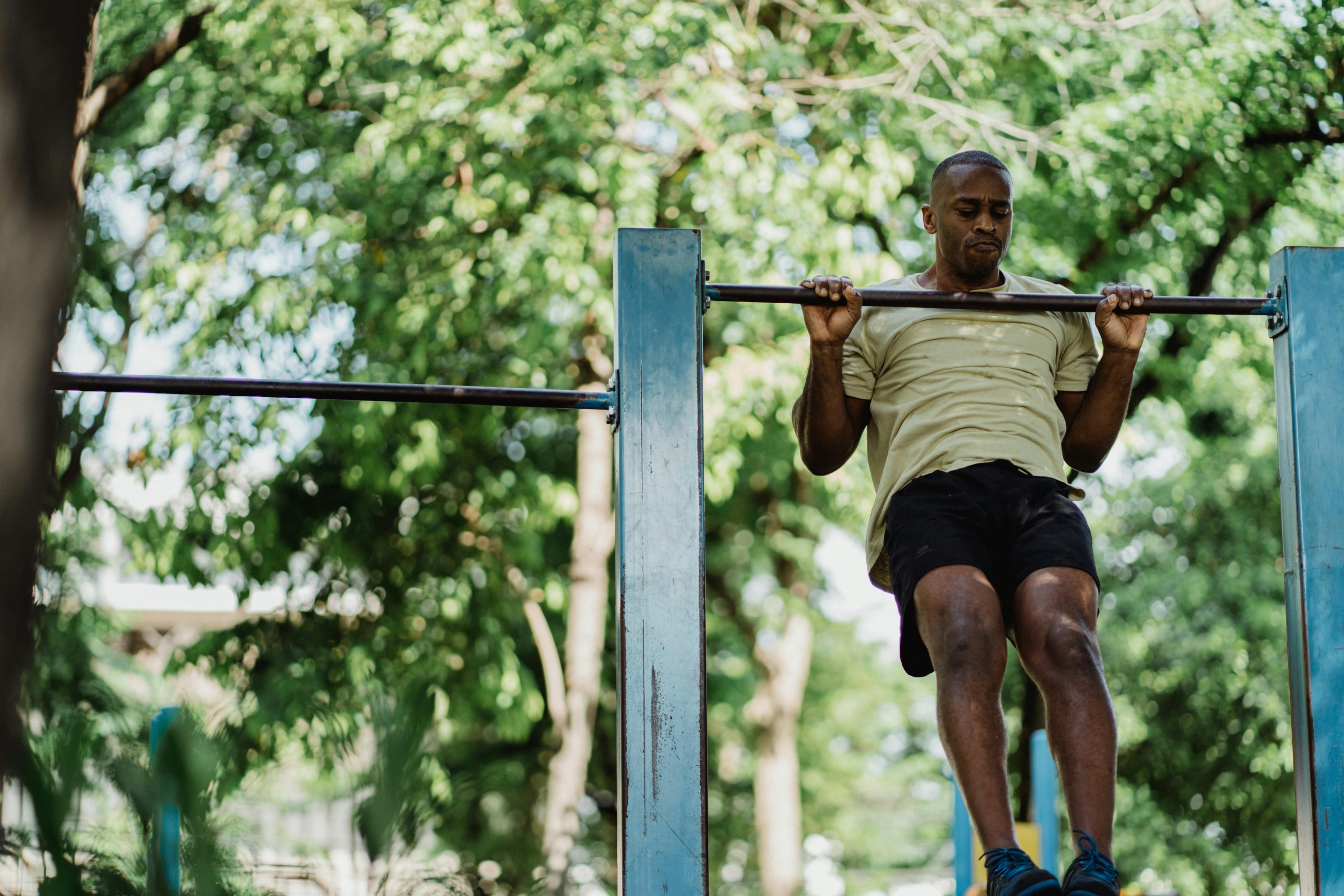 Photo by Ketut Subiyanto: https://www.pexels.com/photo/an-athlete-exercising-on-a-metal-bar-4803667/