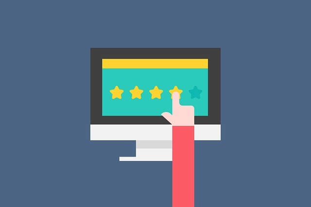 A cartoon image of a computer with a finger touching the fourth star, symbolizing customer review, feedback.