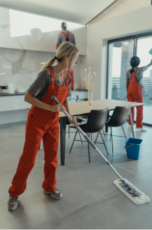 Home cleaner mopping the floors in Dallas