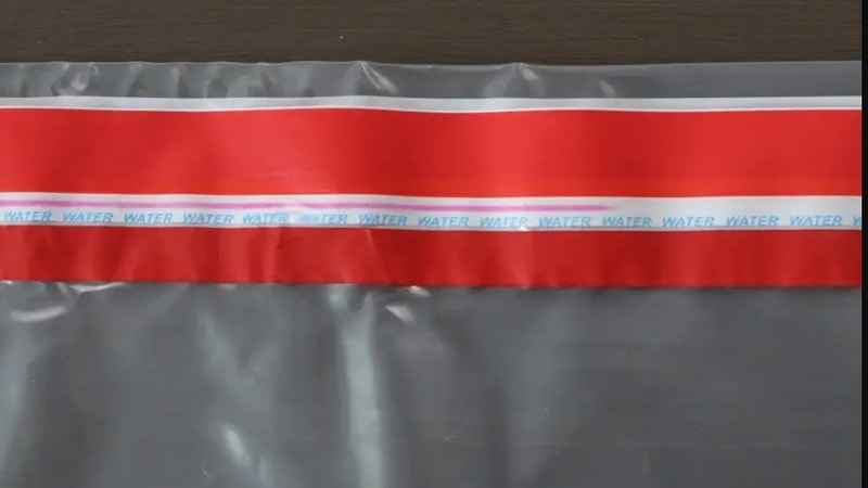ink dissolve on security tape when applying water indicates liquid based tampering