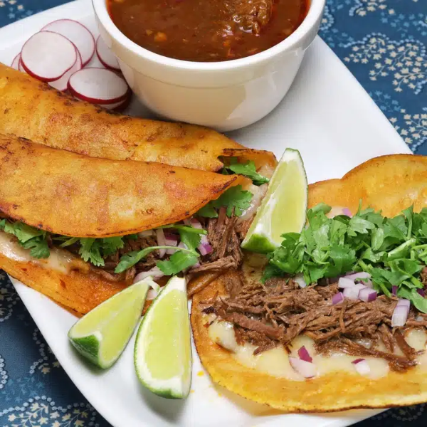 An image highlighting quesabirria: Mexican catering menu item from Rooster's Rollling BBQ. 