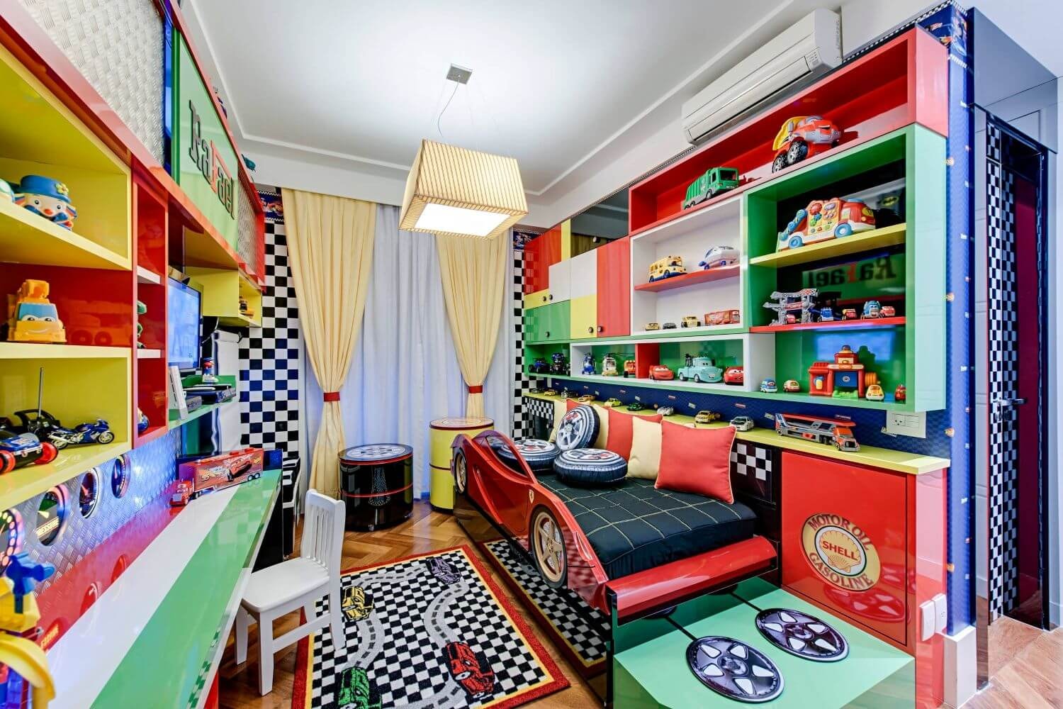 In a vibrant transportation-themed room, colourful toy cars are neatly arranged on shelves, showcasing fun kids decor ideas for a toddler boy's space. This setup emphasises smart storage and imaginative play, perfect for creating an inspiring environment for young children.