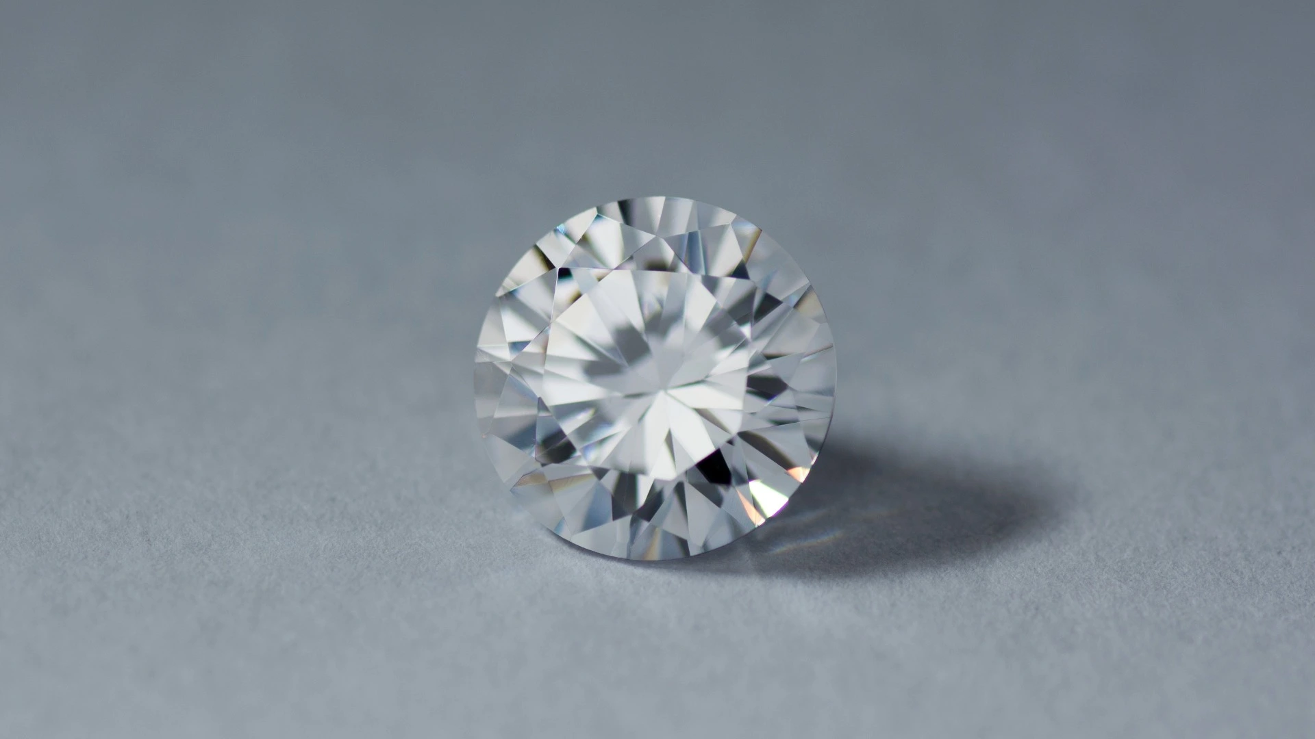 Round cubic zirconia on a grey background