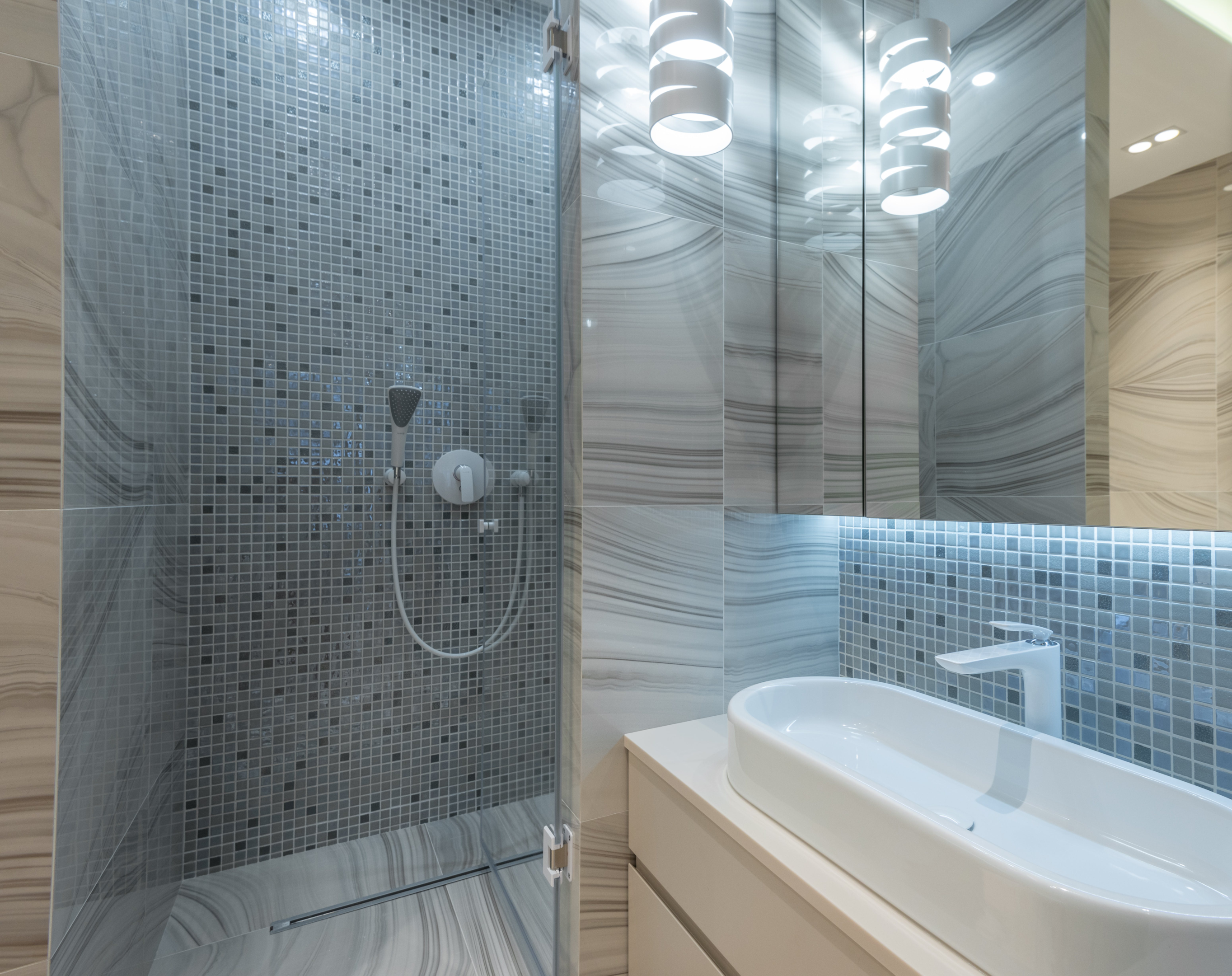Choose mosaic tiles to accentuate a feature wall such as shelving units, sink areas or walk in shower cubicles.
