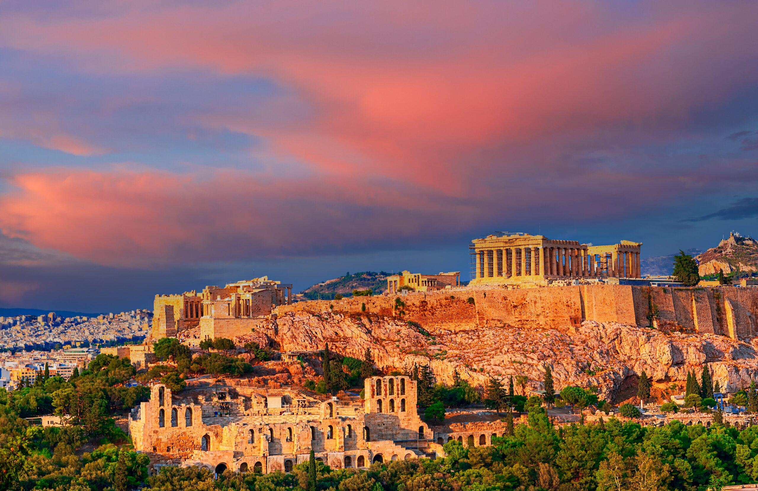 Athens Acropolis and city skyline at sunset, highlighting Athens as one of the best places to live in Greece for UK expats moving to Greece from UK.