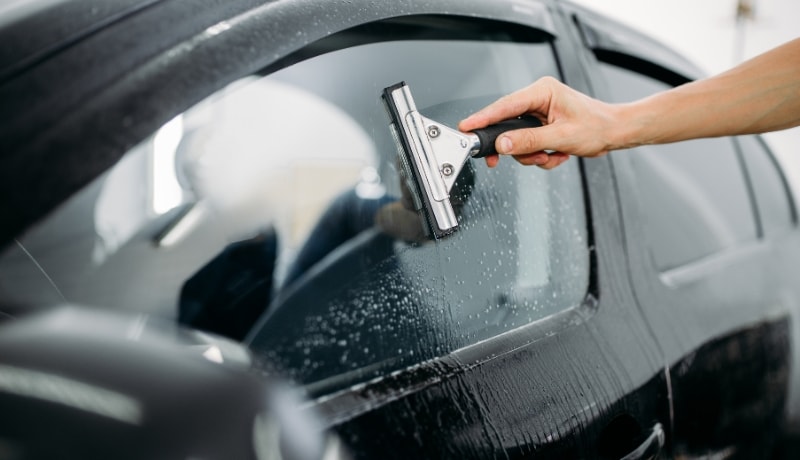 Right tint film installation on vehicle windows for preventing uv exposure