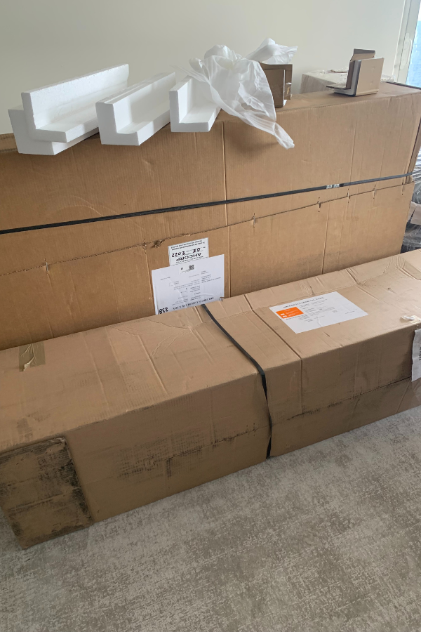 transported boxes delivered to an interior design installation