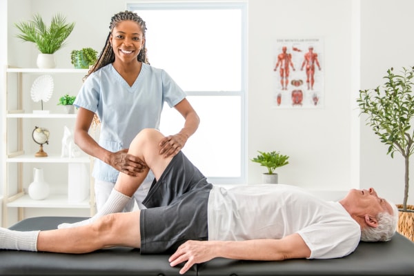 Chiropractor with patient