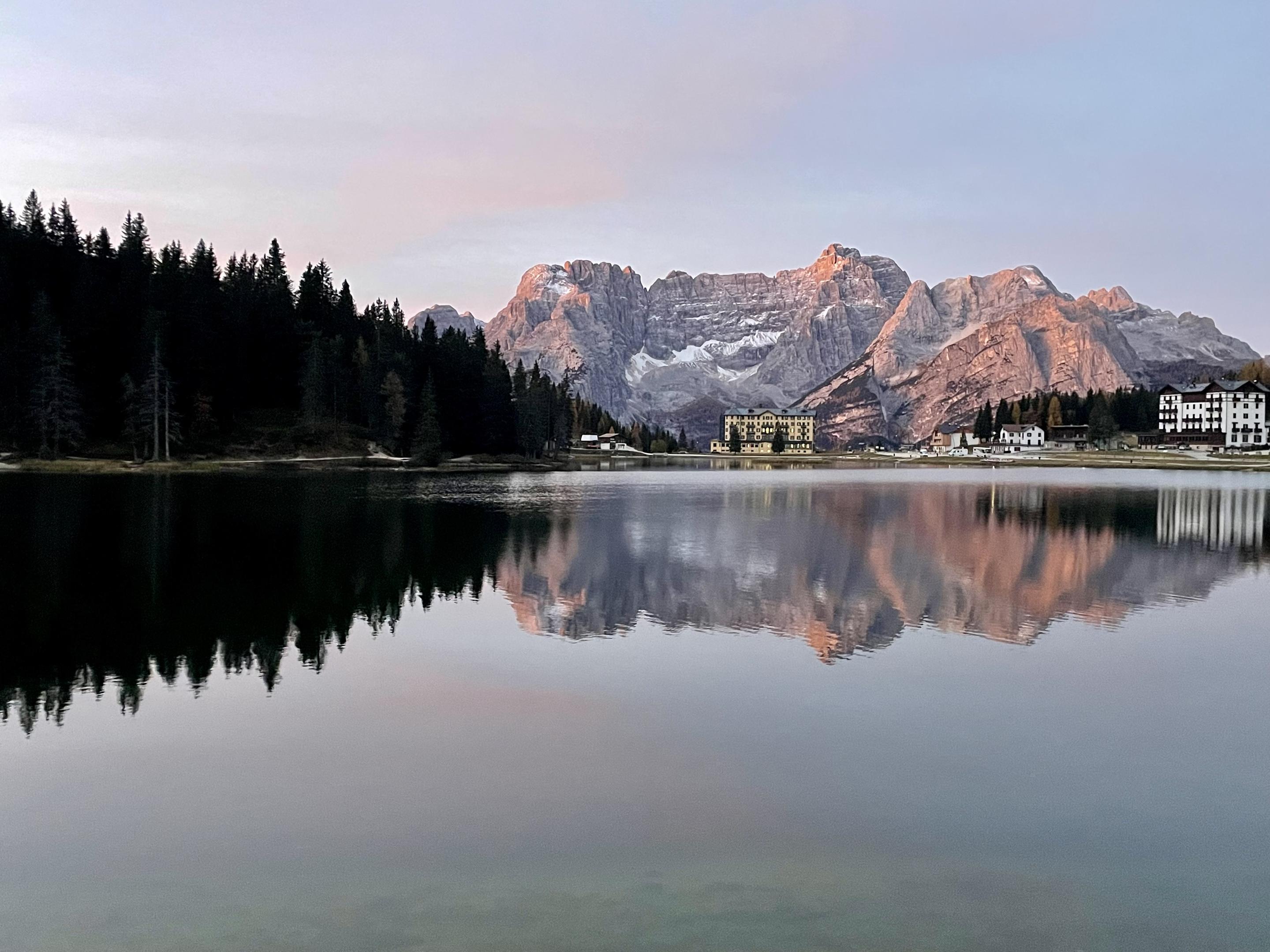 Sunrise over a lake in the Dolomites, Italy