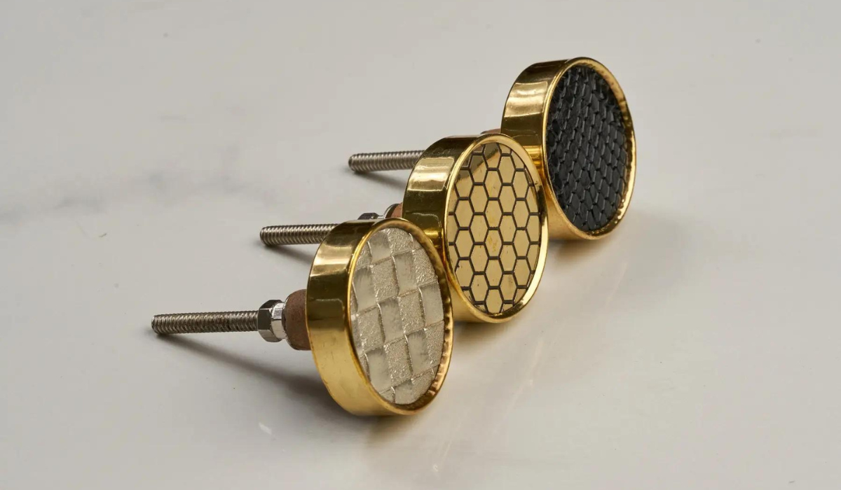 Art Deco-style bathroom cabinet knobs - round with geometric pattern inlays