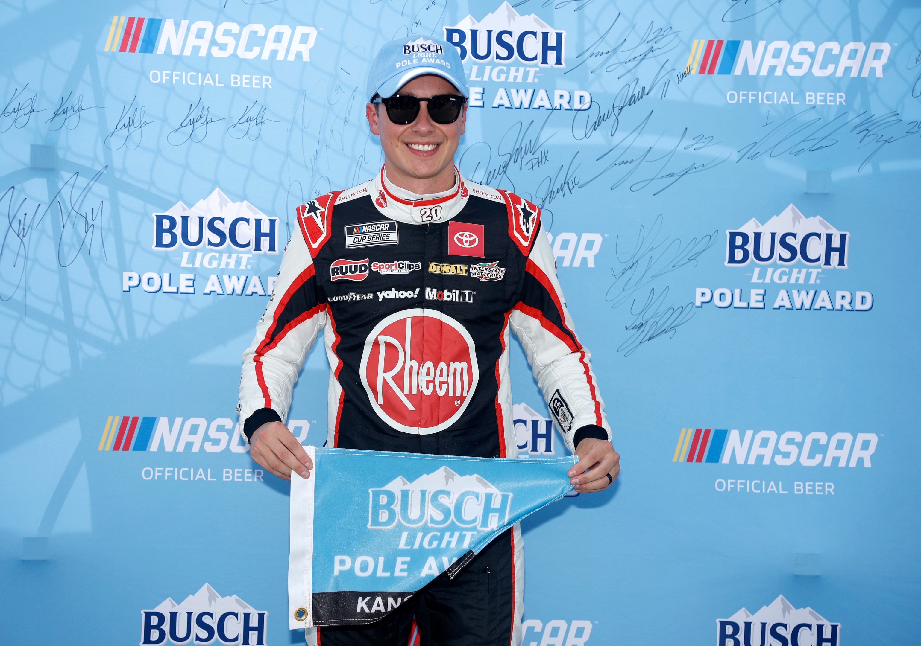 Christopher Bell, driver of the #20 Rheem Toyota, poses for photos after winning the pole award during qualifying for the NASCAR Cup Series Hollywood Casino 400 Presented by ESPN BET at Kansas Speedway on September 28, 2024 in Kansas City, Kansas.