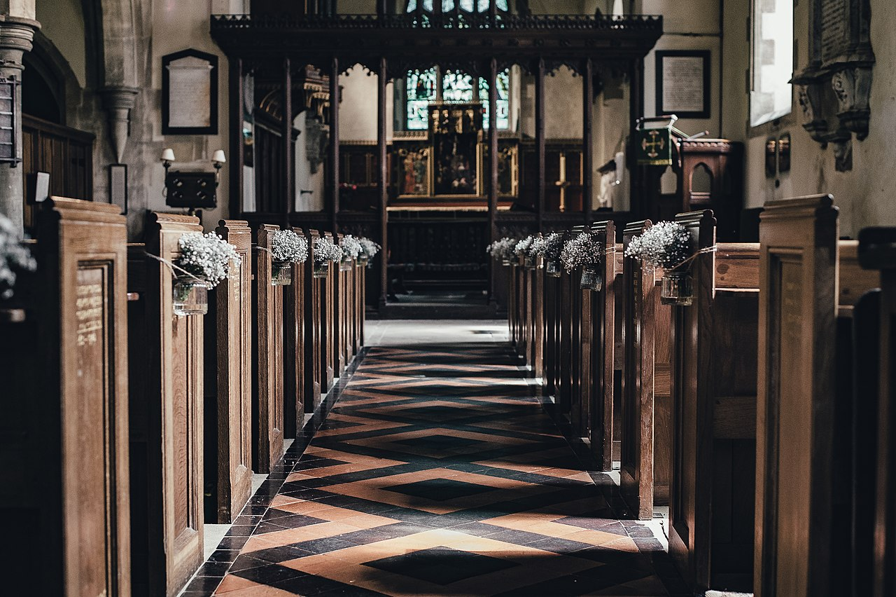 A decorated wedding aisle in an old church. (Photo: Wikimedia)