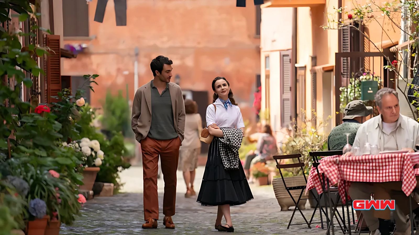 Eugenio Franceschini as Marcello, Lily Collins as Emily in Emily in Paris