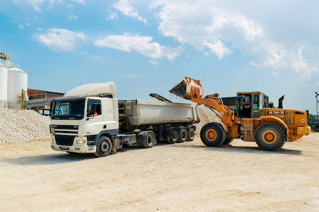 two consruction vehicles on-site