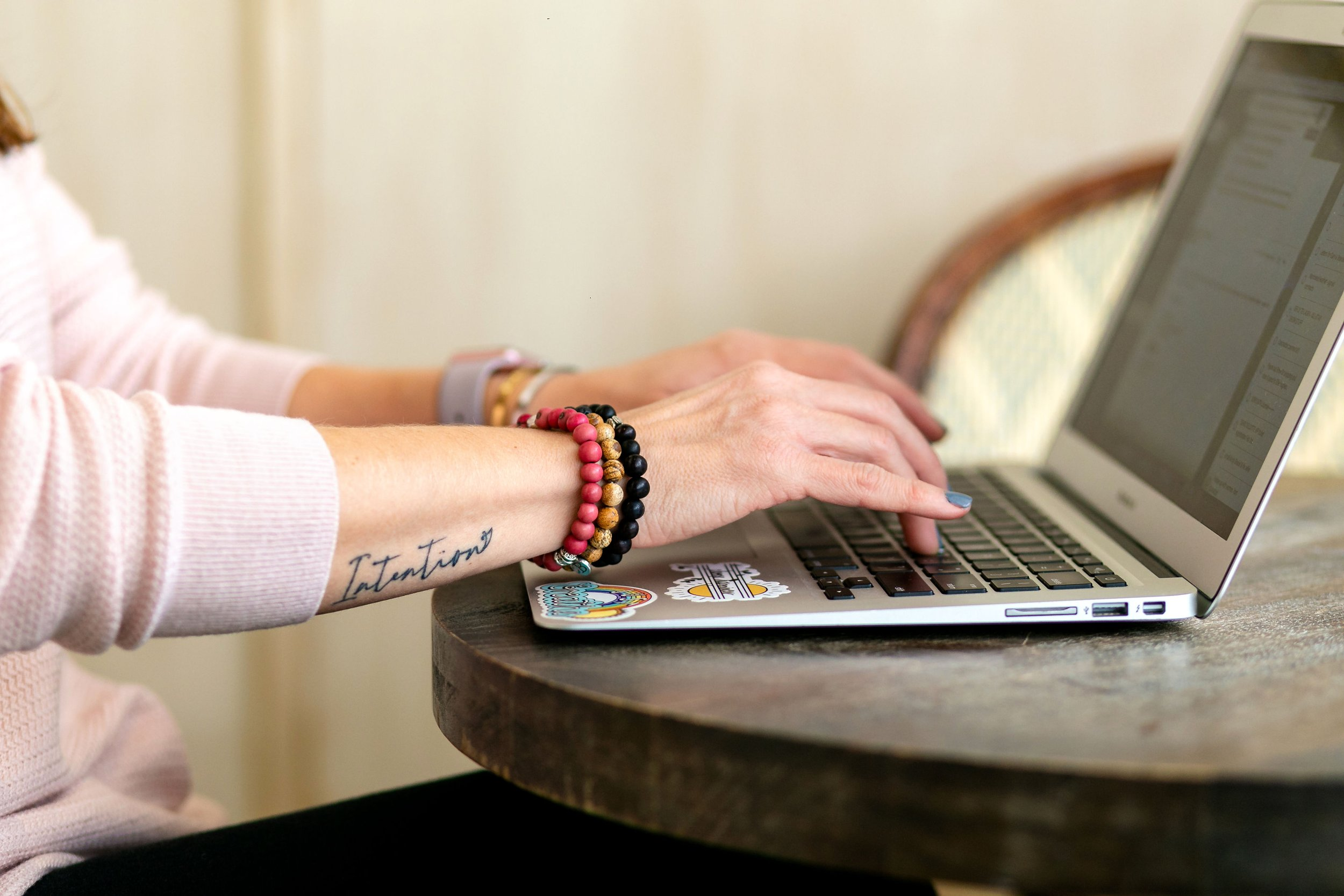 A person researching and comparing vehicles online, considering the process of purchasing a car with cash