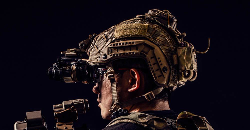 soldier wearing tactical helmet with accessories