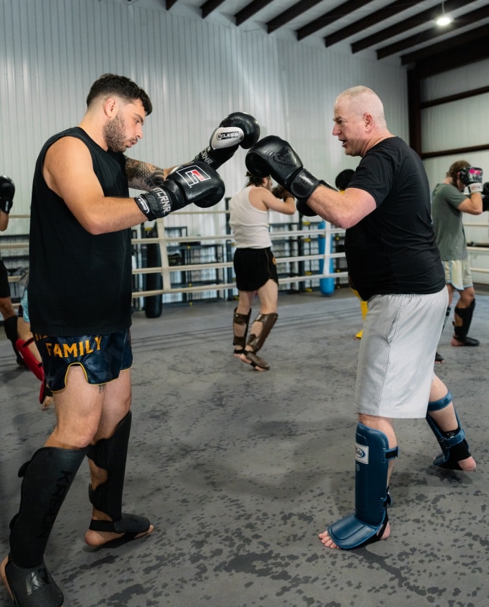 Adult martial arts students at martial arts schools can train in a variety of disciplines—such as Krav Maga, Kung Fu, Muay Thai, Tae Kwon Do, and other Chinese and Korean martial arts—building physical fitness, self-defense skills, joint lock techniques, and ground fighting ability while developing self-confidence, self-discipline, and the determination to earn a black belt.